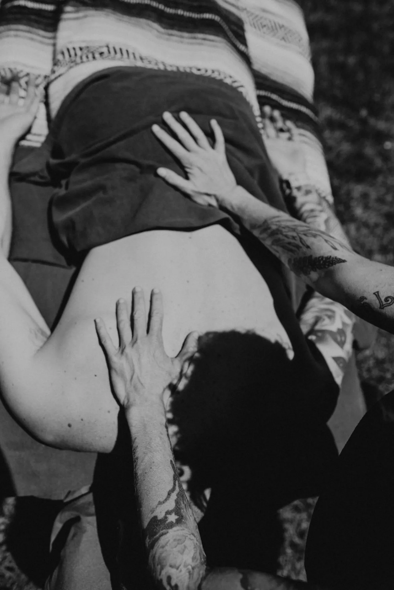Outdoor massage session, black and white